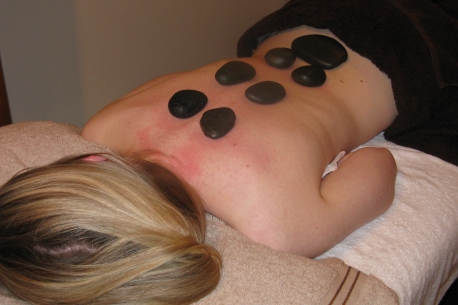 Photograph showing hot stones back massage